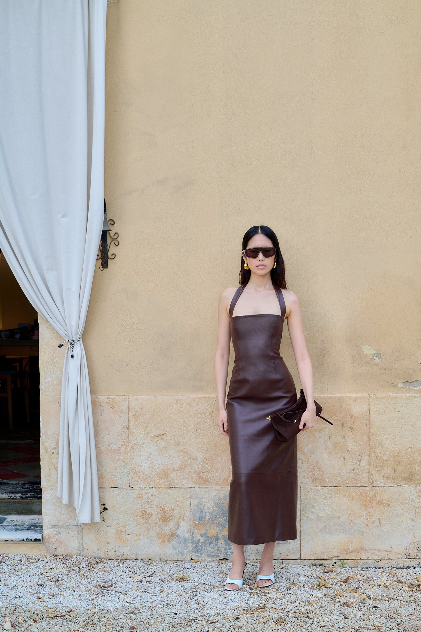 A LITTLE LATER THAN PLANNED LEATHER DRESS