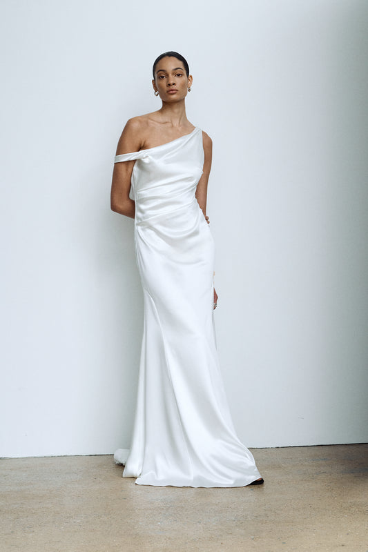 Draped bridal gown with asymmetric neckline, front view