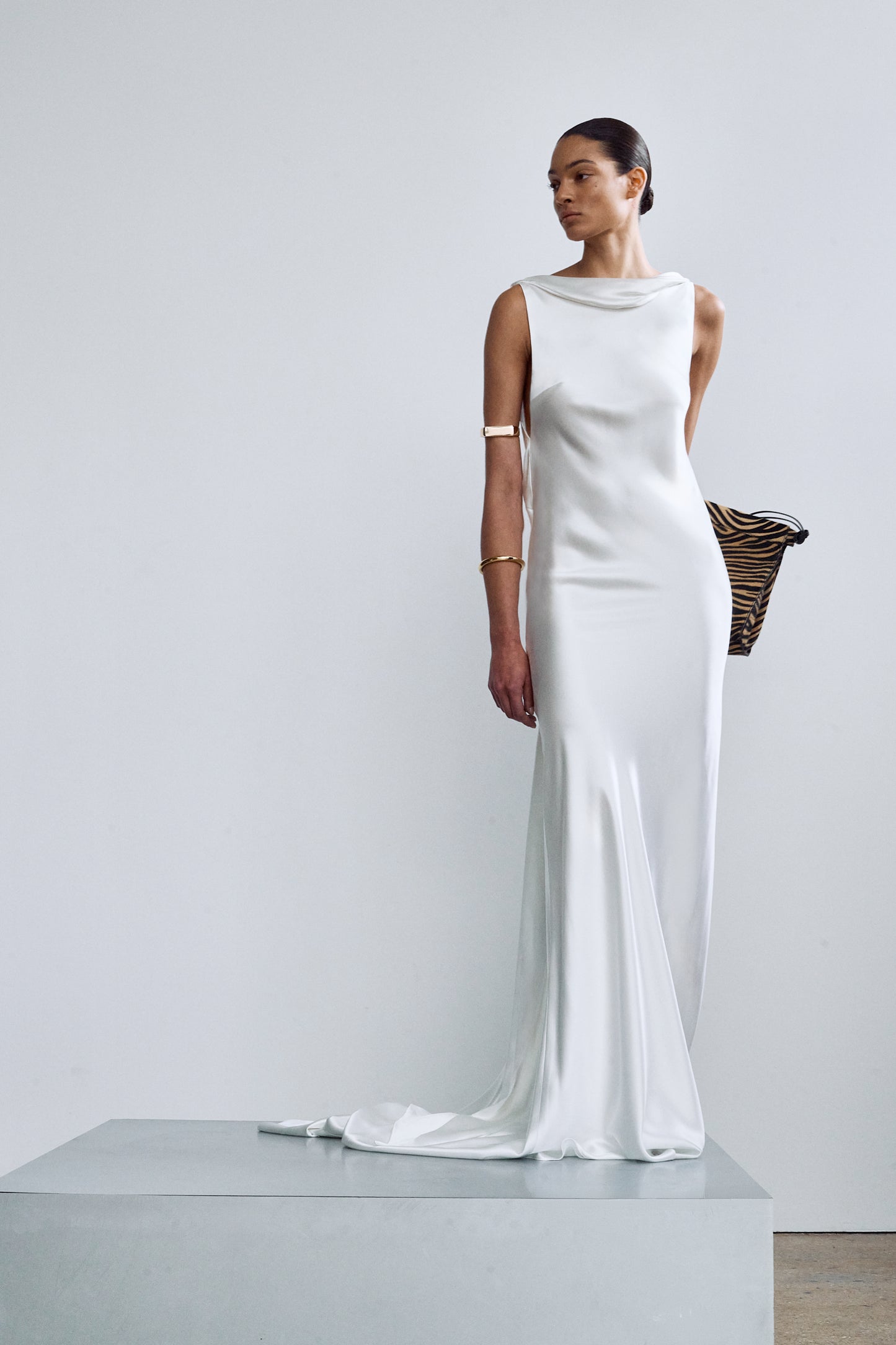 Modern, minimalist white silk wedding gown
